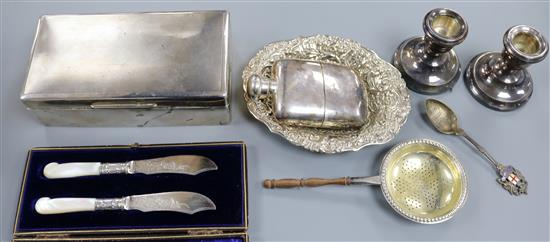 A silver cigarette cas, silver hip flask, silver bonbon dish and five other items including pair of dwarf candlesticks.